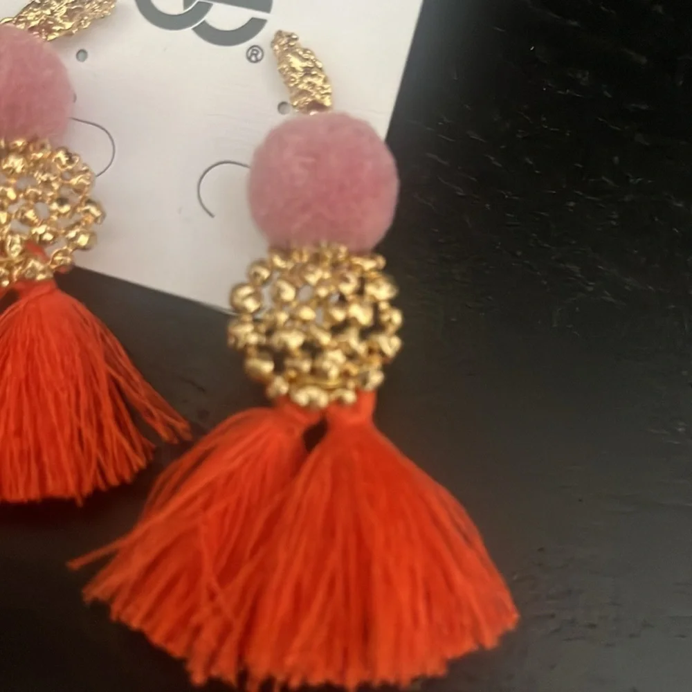 Francesca’s pom pom tassle earrings